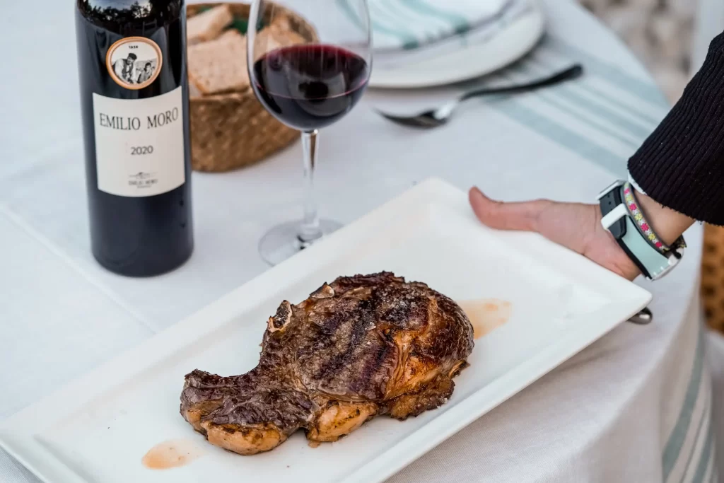 Detail of grilled T-bone steak dish