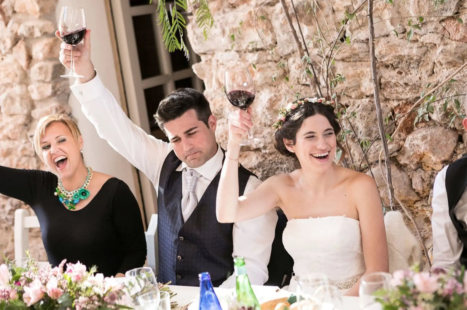 Wedding couple toasting in Ses Escoles