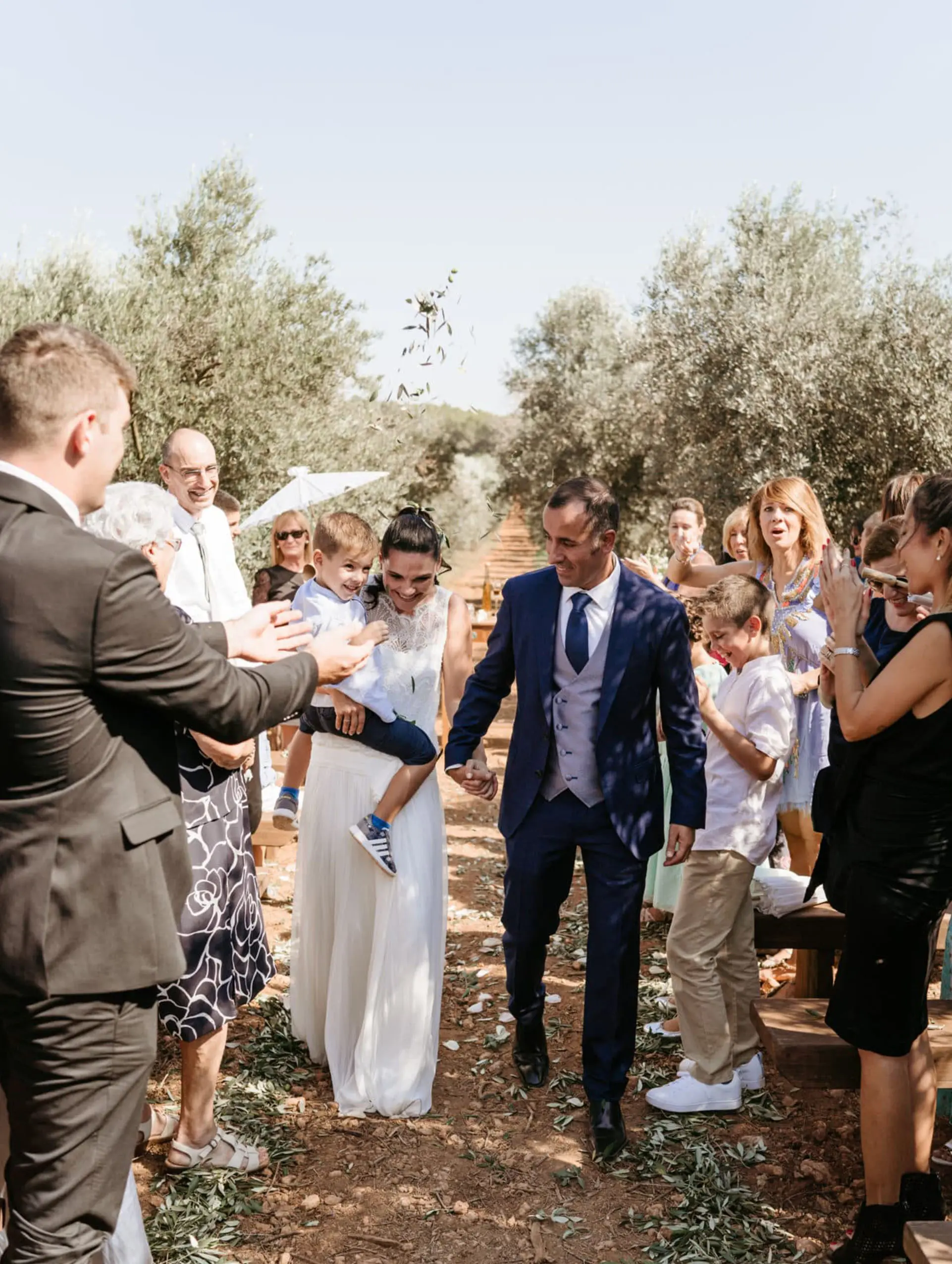 Wedding couple with guests at Ses Escoles